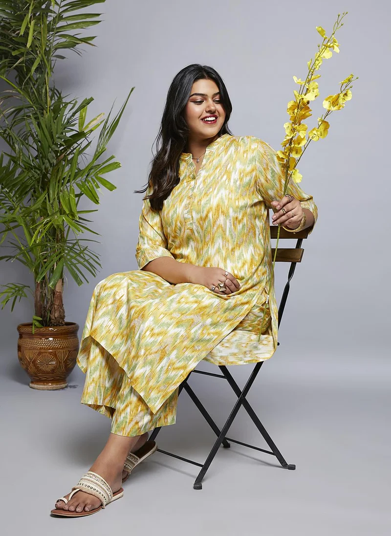 جلو باص طقم كورتا وبنطلون جلوبلس جلوبلس نسائي بياقة ماندرين وطبعات شيفرون وزاري مقاس كبير